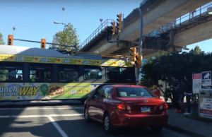 TransLink Trolleybus Misses Turn & Crashes Into Stoplight (Video)